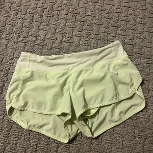 Lululemon size 4 neon green/ yellow shorts.